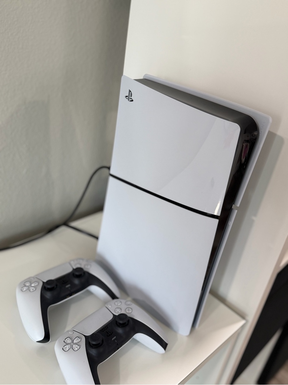 Sony PlayStation 5 Console with DualSense Controllers - White & Black